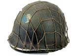 Model M-1 steel helmet with the 29th Infantry Division insignis on display at The National World War II Museum.